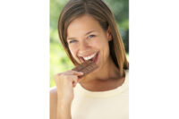 Woman eating chocolate