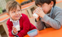 boys drinking milk