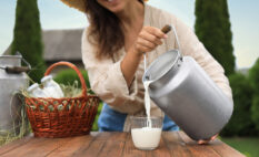 woman pouring milk