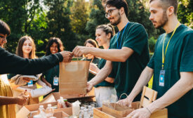 volunteers handing out food