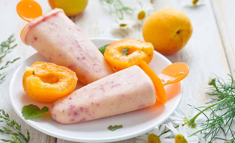 Apricot fruit flavors and fruit blends in frozen yogurt pops bring creaminess with less added sugar.